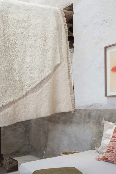 Nomade Suf Woolable Rug by Lorena Canals, showing nomade suf woolable rug in live shot.