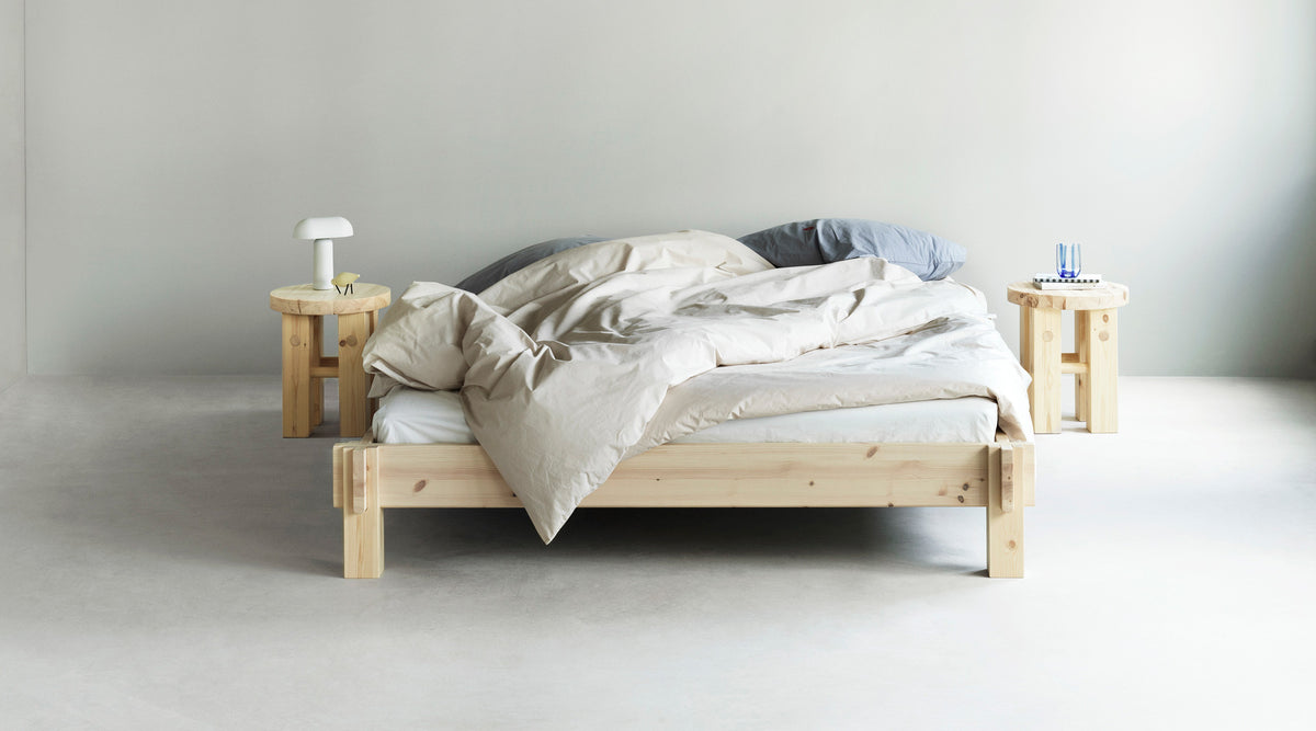 Notch Bed Frame by Normann Copenhagen, showing notch bed frame in live shot.