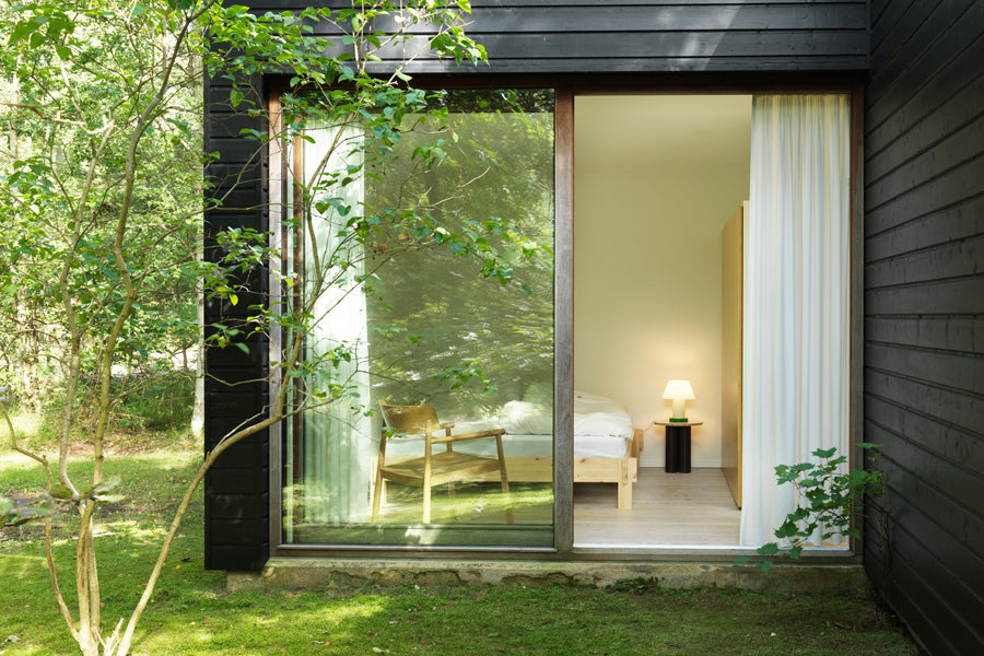 Notch Bed Frame by Normann Copenhagen, showing notch bed frame in live shot.