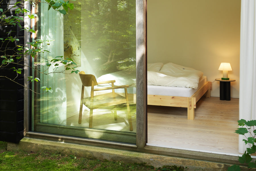 Notch Bed Frame by Normann Copenhagen, showing notch bed frame in live shot.
