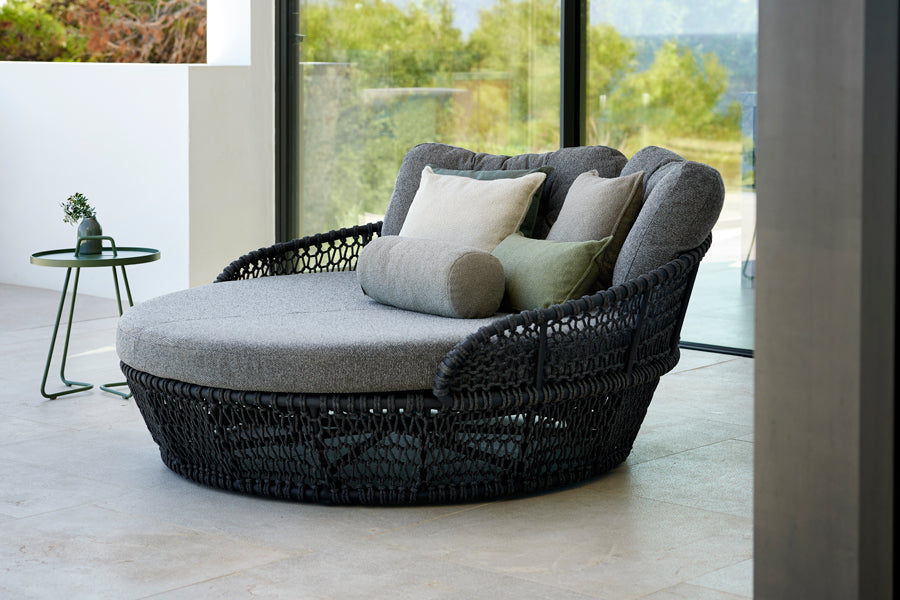Ocean Daybed by Cane-Line, showing ocean daybed in live shot.