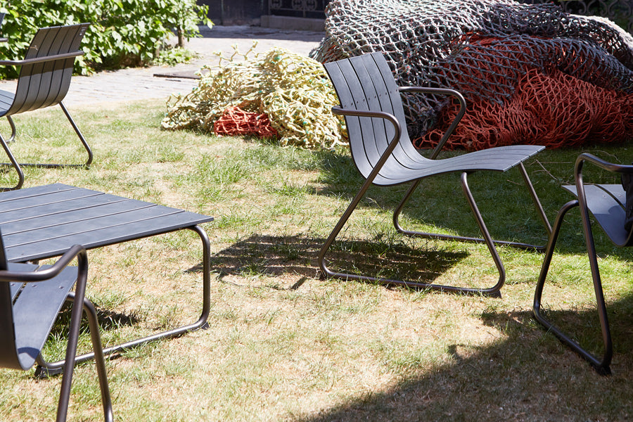 Ocean Lounge Table by Mater, showing closeup view of ocean lounge table in live shot.