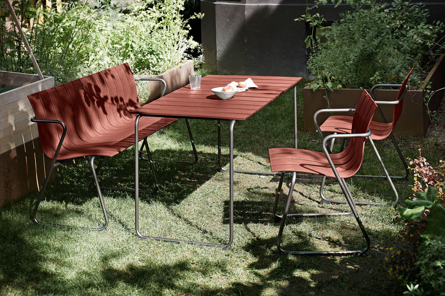 Ocean Table by Mater, showing ocean table with chairs & bench in live shot.