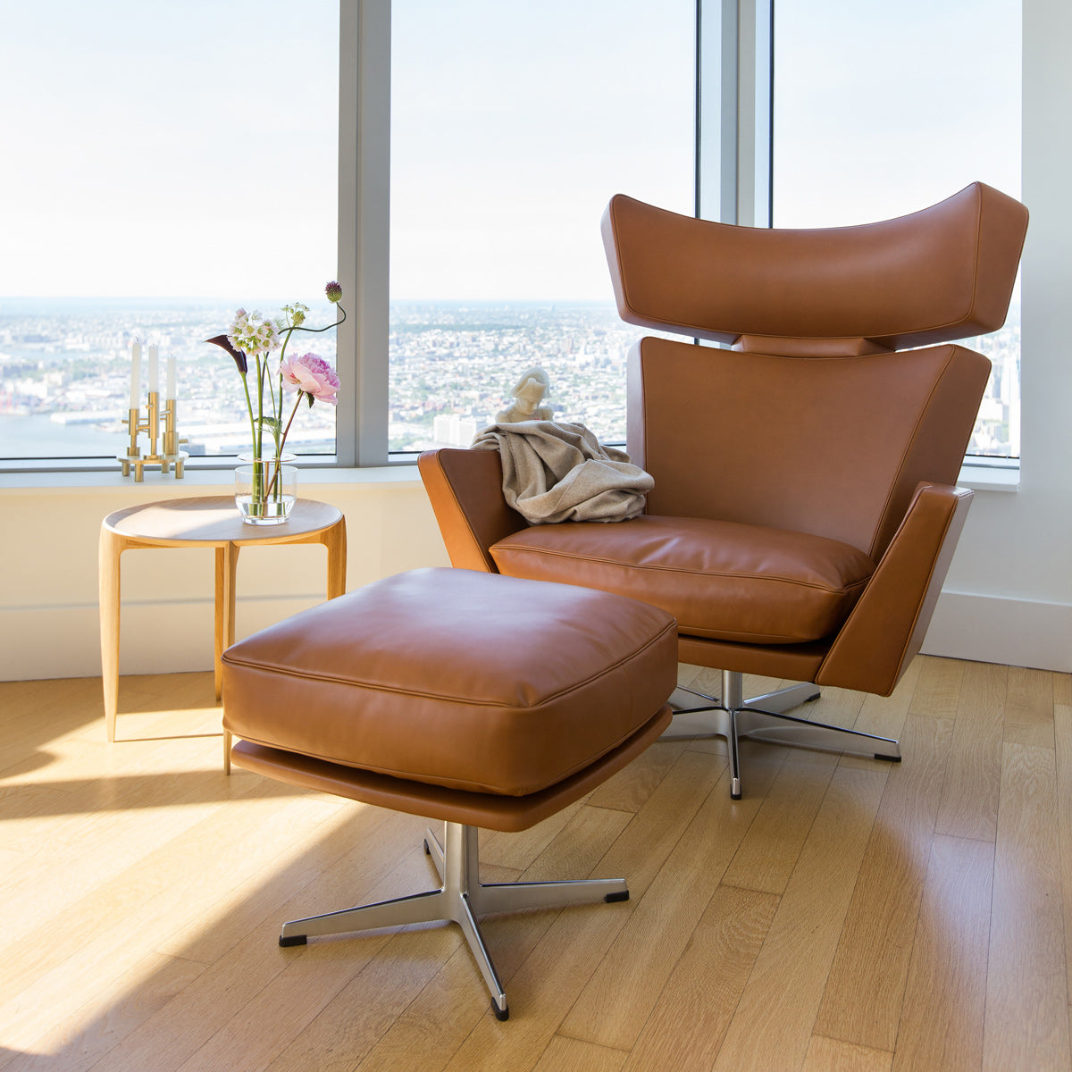 Oksen Footstool by Fritz Hansen, showing oksen footstool in live shot.