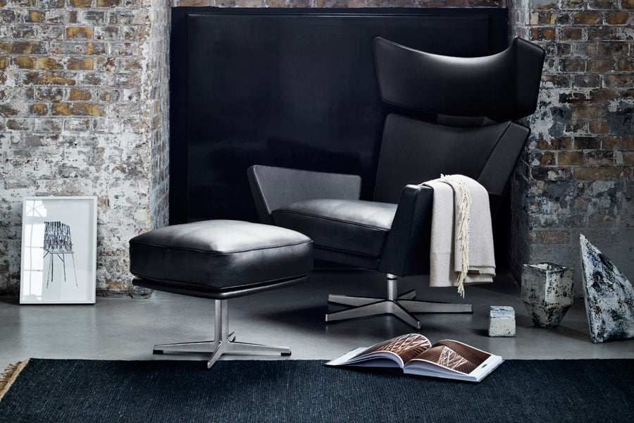 Oksen Footstool by Fritz Hansen, showing oksen footstool in live shot.