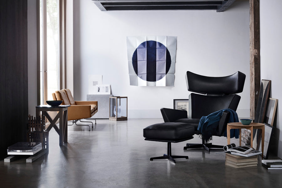 Oksen Footstool by Fritz Hansen, showing oksen footstool in live shot.