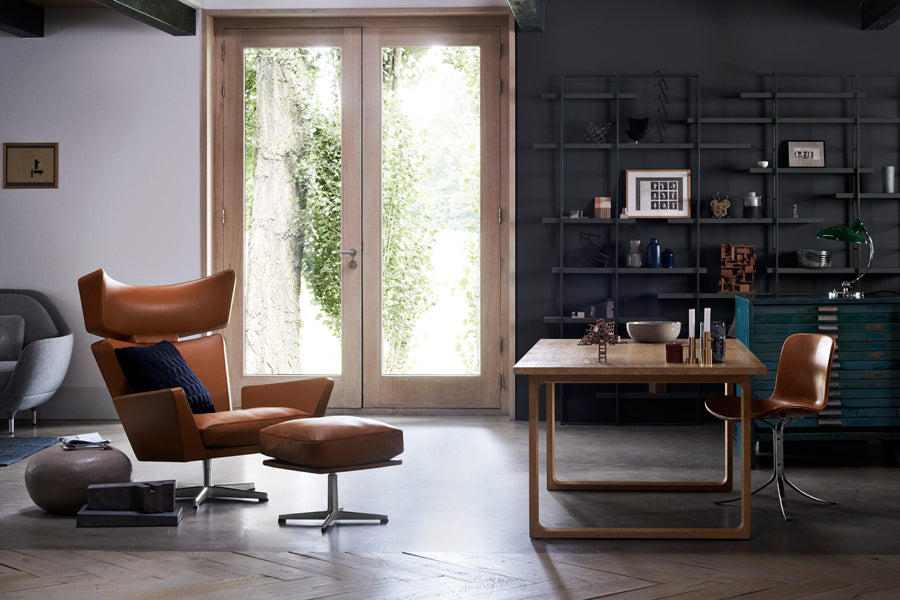 Oksen Footstool by Fritz Hansen, showing oksen footstool in live shot.
