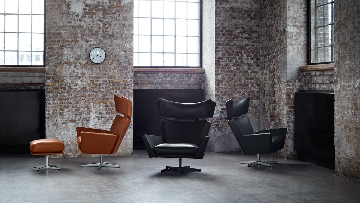 Oksen Lounge Swivel Chair by Fritz Hansen, showing oksen lounge swivel chairs in live shot.