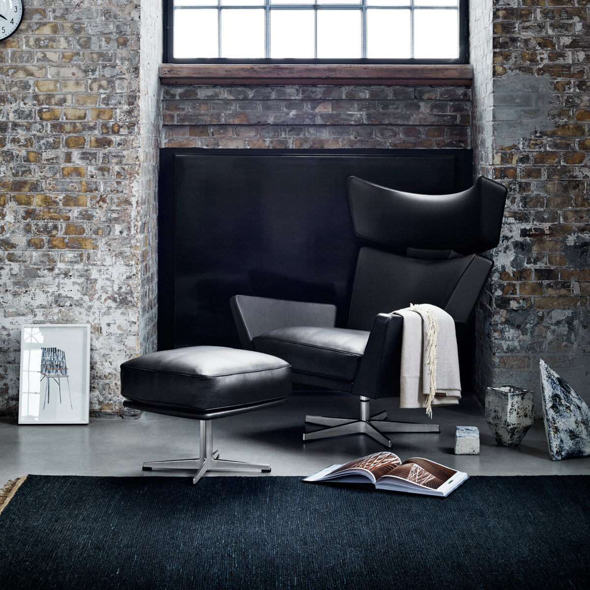Oksen Lounge Swivel Chair by Fritz Hansen, showing oksen lounge swivel chair in live shot.
