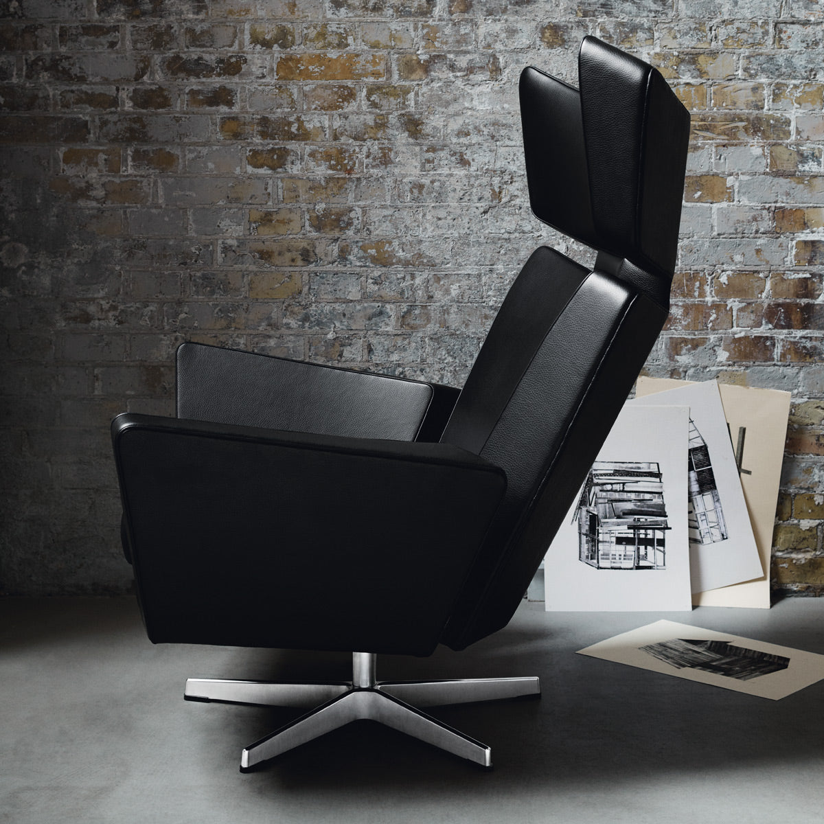 Oksen Lounge Swivel Chair by Fritz Hansen, showing oksen lounge swivel chair in live shot.