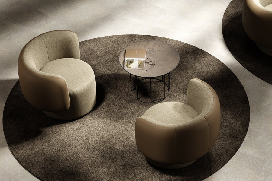 Ora Swivel Lounge Chair by B&T, showing ora swivel lounge chairs in live shot.