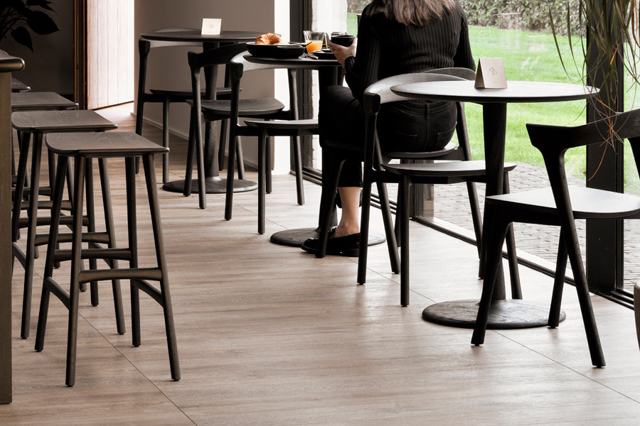 Osso Stool by Ethnicraft, showing osso stools in live shot.