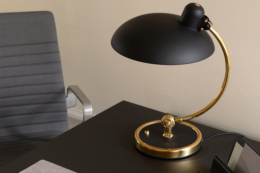 Oxford 4-Star Base Armchair by Fritz Hansen, showing closeup view of oxford 4-star base armchair in live shot.