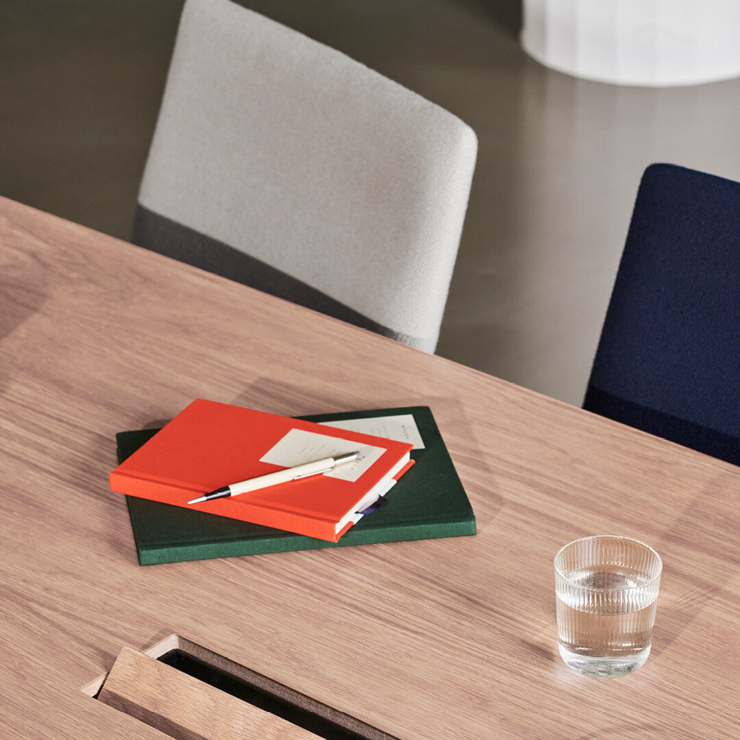 Oxford 5-Star Base Chair by Fritz Hansen, showing closeup view of oxford 5-star base chairs in live shot.
