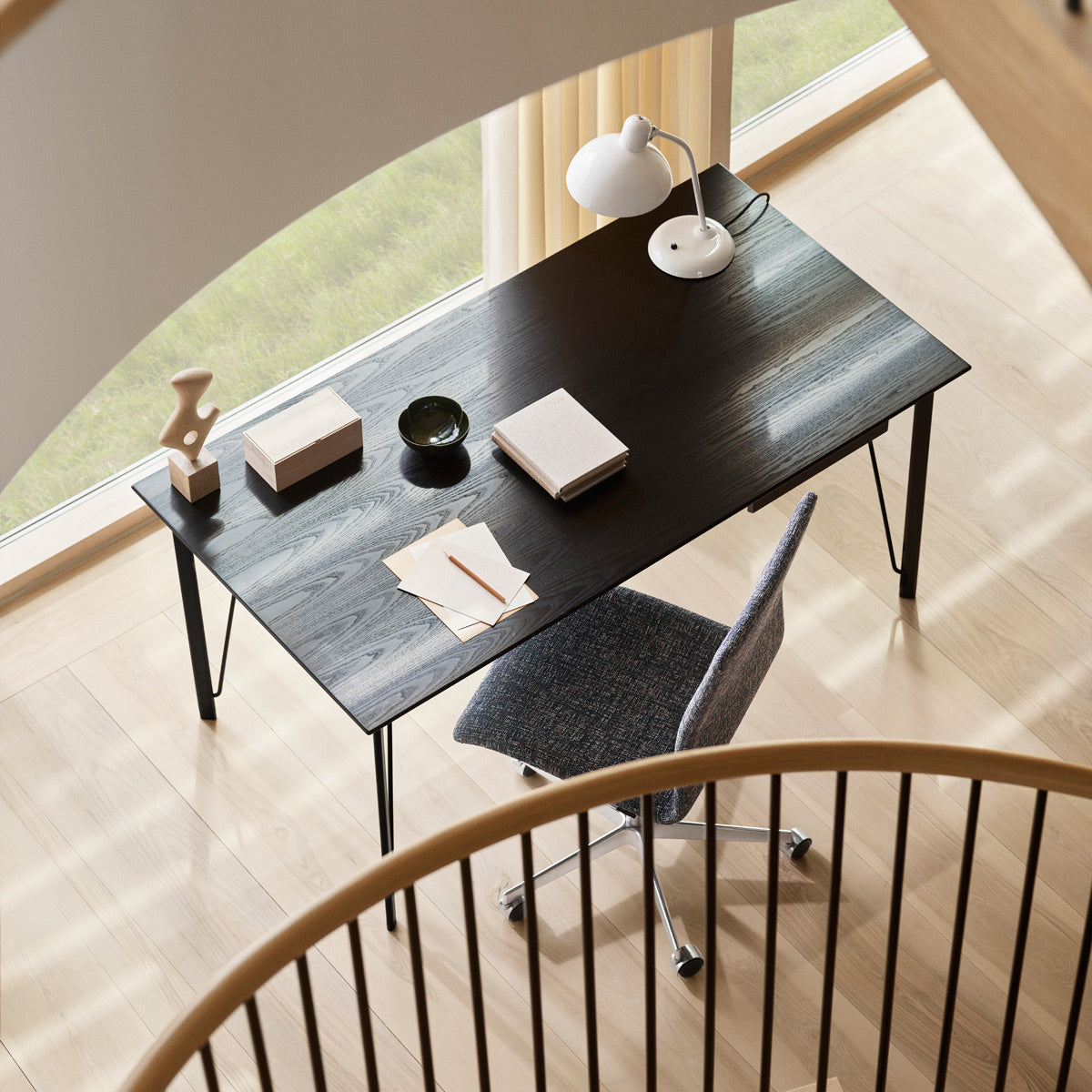 Oxford 5-Star Base Chair with Castors by Fritz Hansen, showing oxford 5-star base chair with castors in live shot.