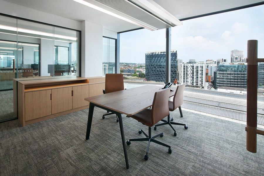 Oxford 5-Star Base Chair with Castors by Fritz Hansen, showing oxford 5-star base chairs with castors in live shot.