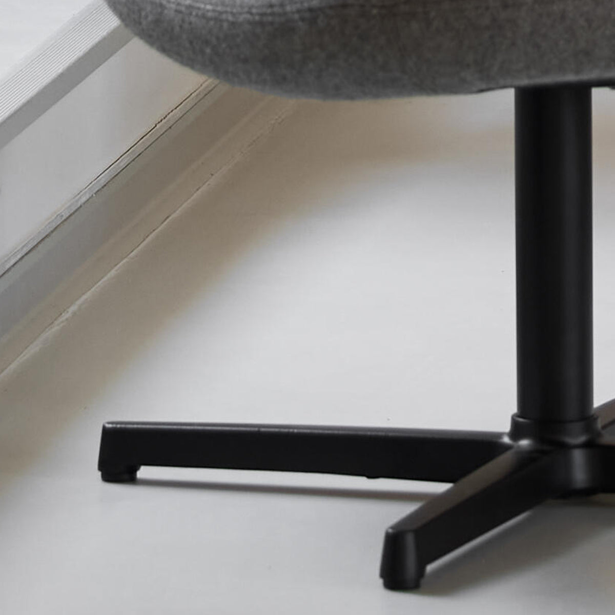 Pace Footstool by Cane-Line, showing closeup view of pace footstool in live shot.