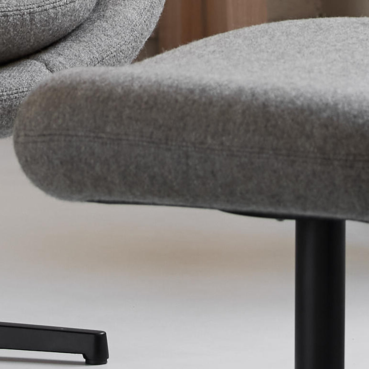 Pace Footstool by Cane-Line, showing closeup view of pace footstool in live shot.