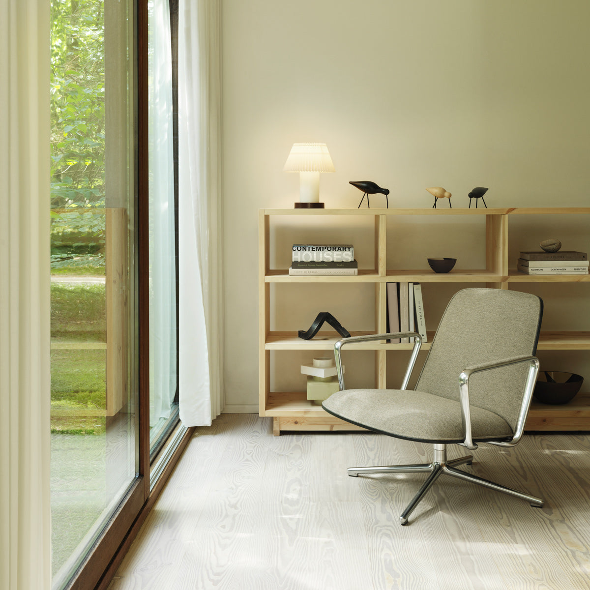 Pad Lounge Swivel Chair by Normann Copenhagen, showing pad lounge swivel chair in live shot.
