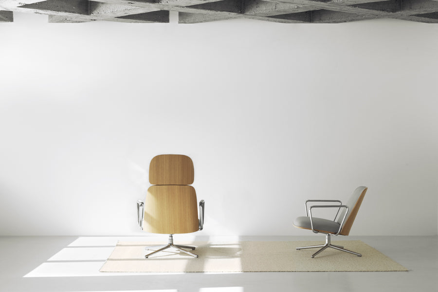 Pad Lounge Tilt Swivel Chair by Normann Copenhagen, showing pad lounge tilt swivel chairs in live shot.