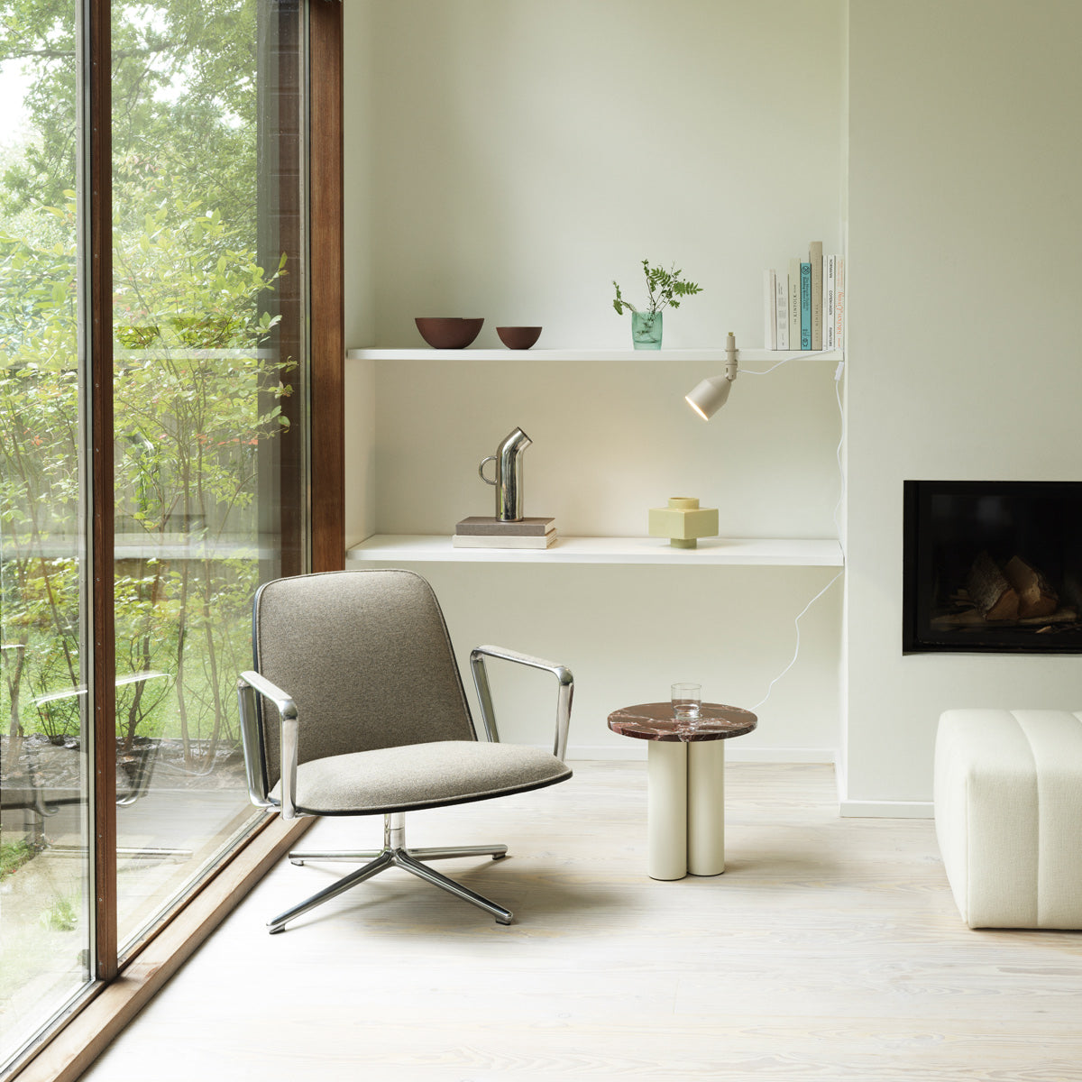 Pad Lounge Tilt Swivel Chair by Normann Copenhagen, showing pad lounge tilt swivel chair in live shot.