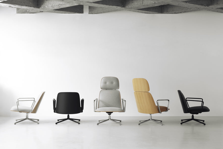 Pad Lounge Tilt Swivel Chair by Normann Copenhagen, showing pad lounge tilt swivel chairs in live shot.