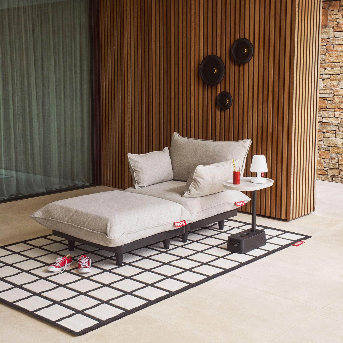 Paletti Lounge Chair by Fatboy, showing paletti lounge chair in live shot.