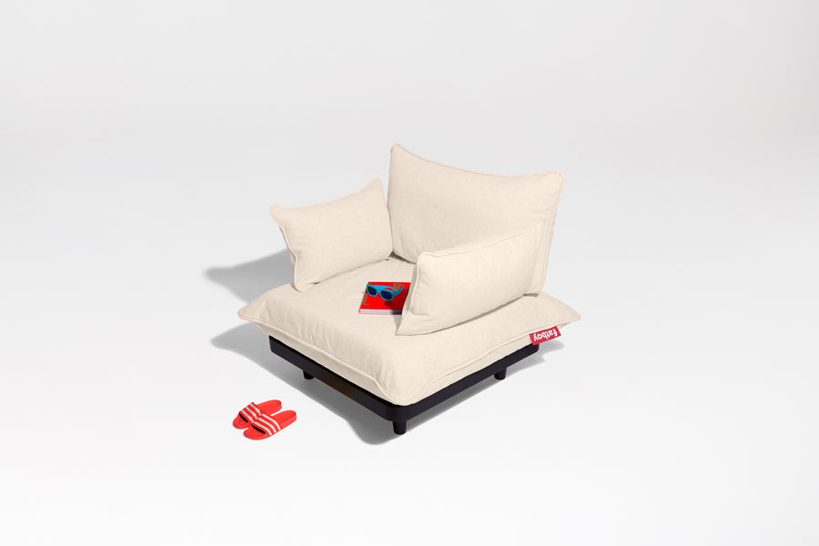 Paletti Lounge Chair by Fatboy, showing paletti lounge chair in live shot.