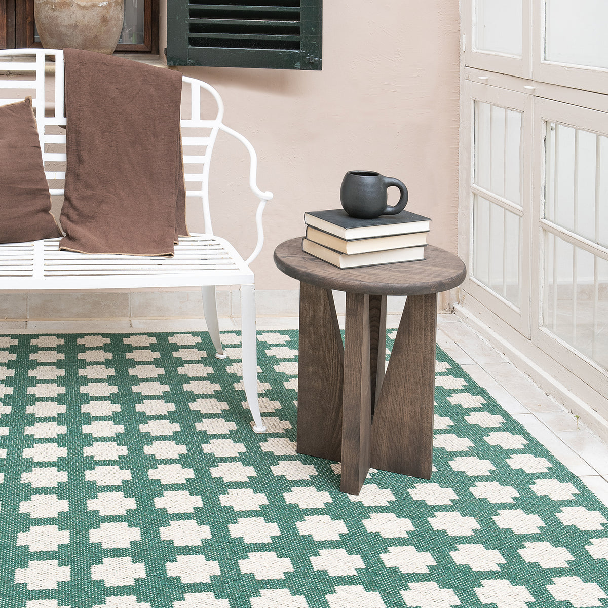 Paloma Woven Plastic Rug by Brita, showing paloma woven plastic rug in live shot.