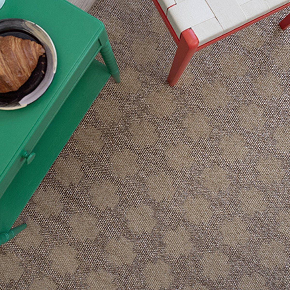 Paloma Woven Plastic Rug by Brita, showing paloma woven plastic rug in live shot.