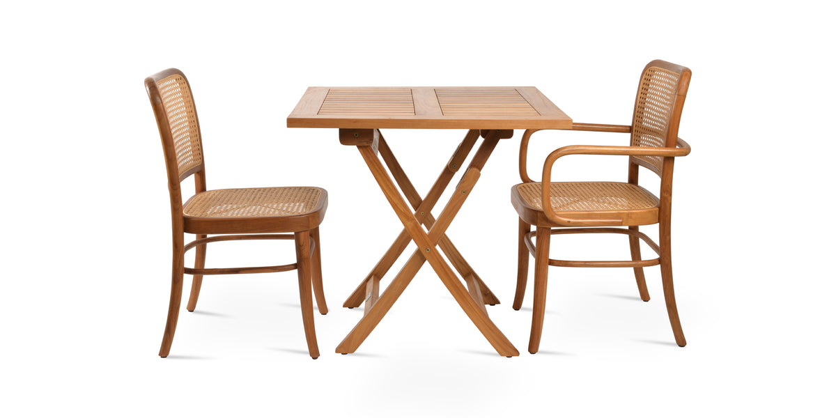 Pamela Folding Dining Table by SohoConcept, showing side view of pamela folding dining table in square/teak wood with chairs.