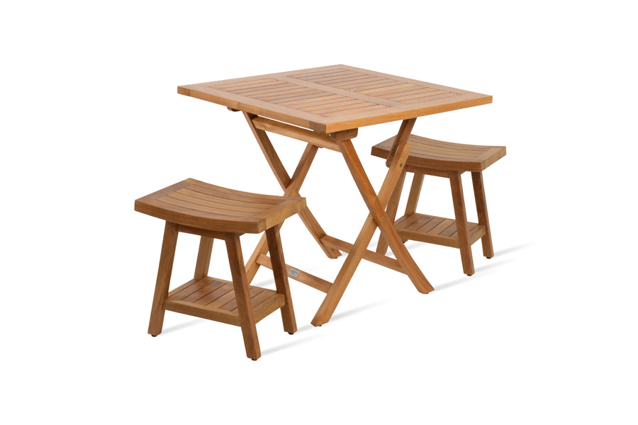 Pamela Folding Dining Table by SohoConcept, showing angle view of pamela folding dining table in square/teak wood with stools.