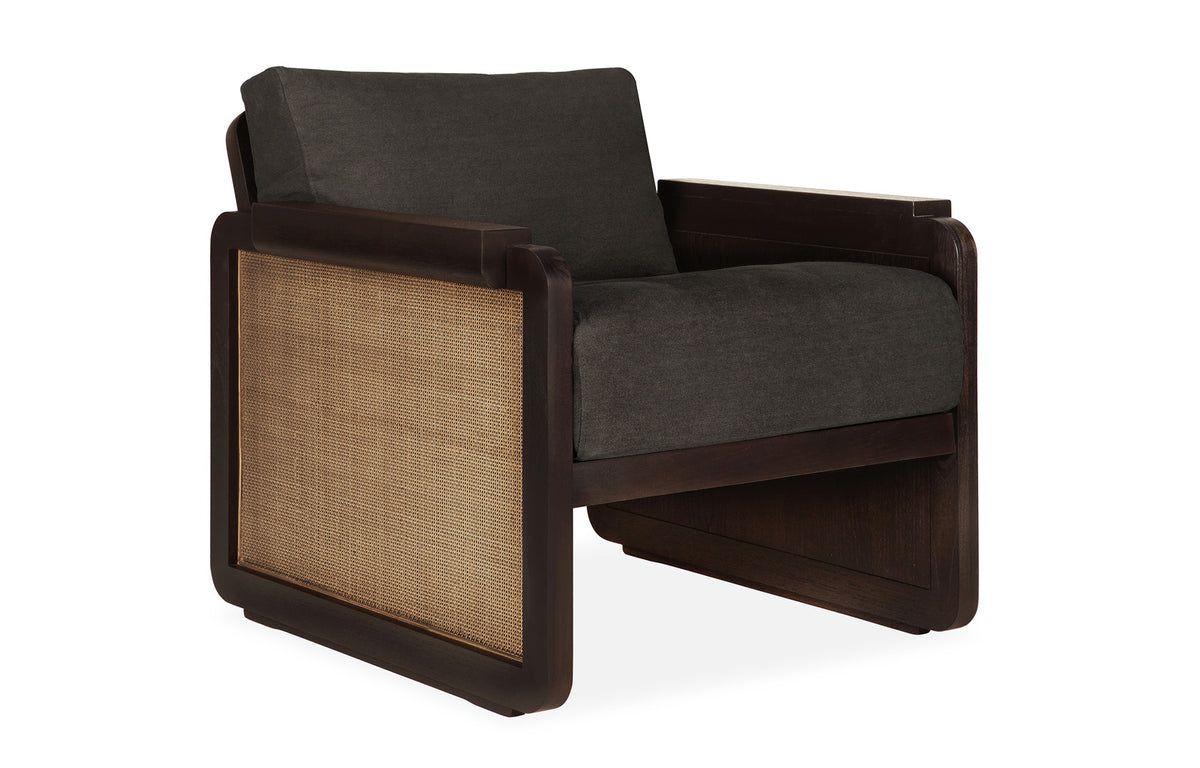 Panel Lounge Chair by Ethnicraft, showing angle view of panel lounge chair.