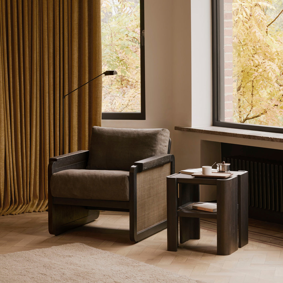 Panel Lounge Chair by Ethnicraft, showing panel lounge chair in live shot.