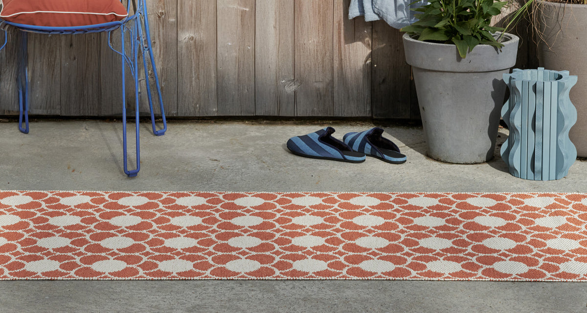 Anya Pale Orange Runner Rug by Pappelina, showing anya pale orange runner rug in live shot.