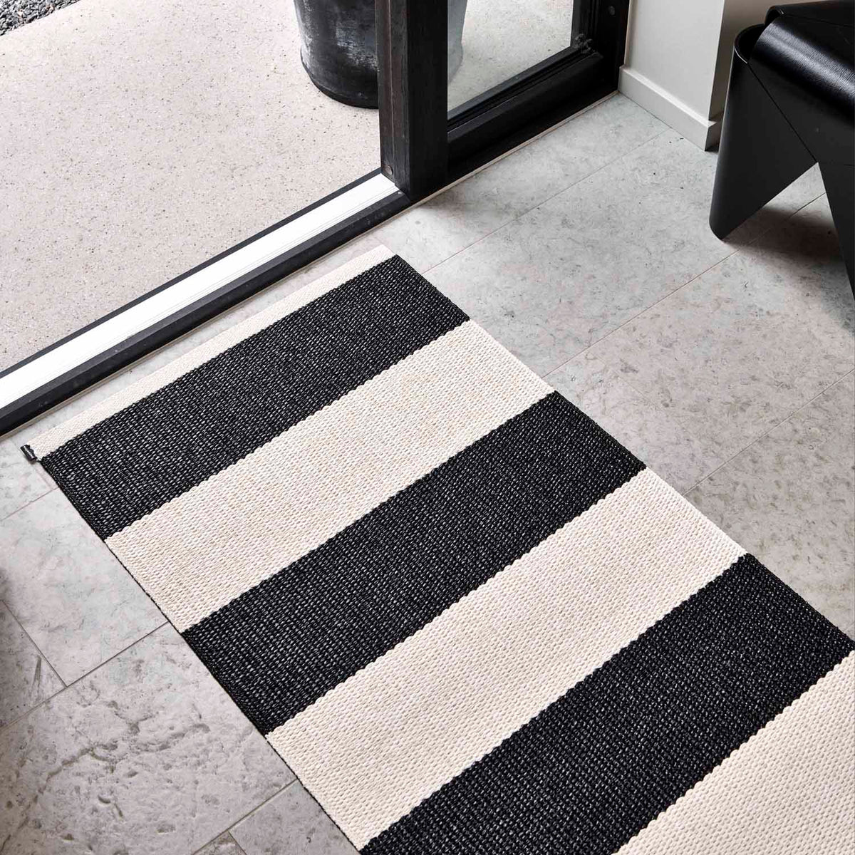 BOB Black Runner Rug by Pappelina, showing bob black runner rug in live shot.