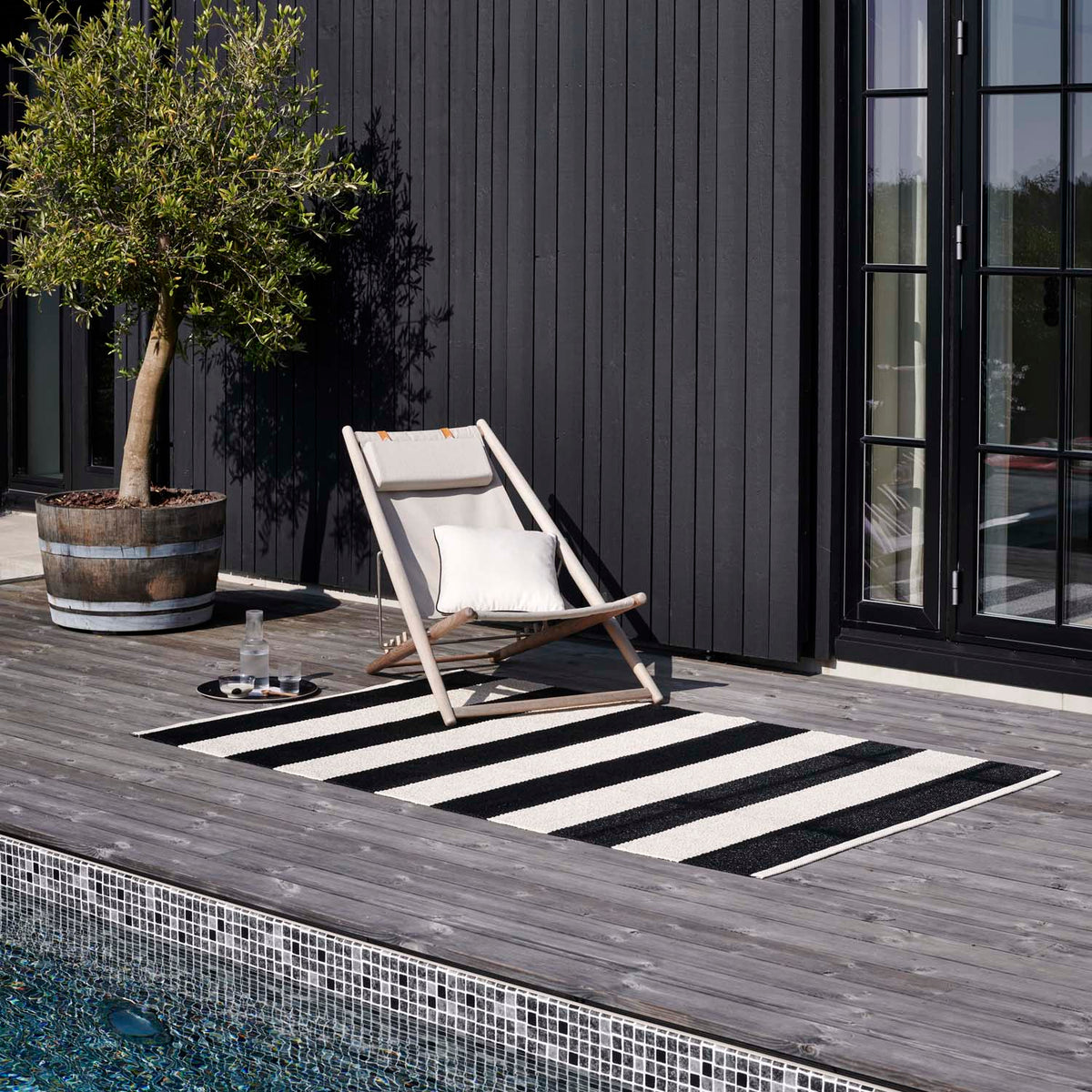 BOB Black Runner Rug by Pappelina, showing bob black runner rug in live shot.
