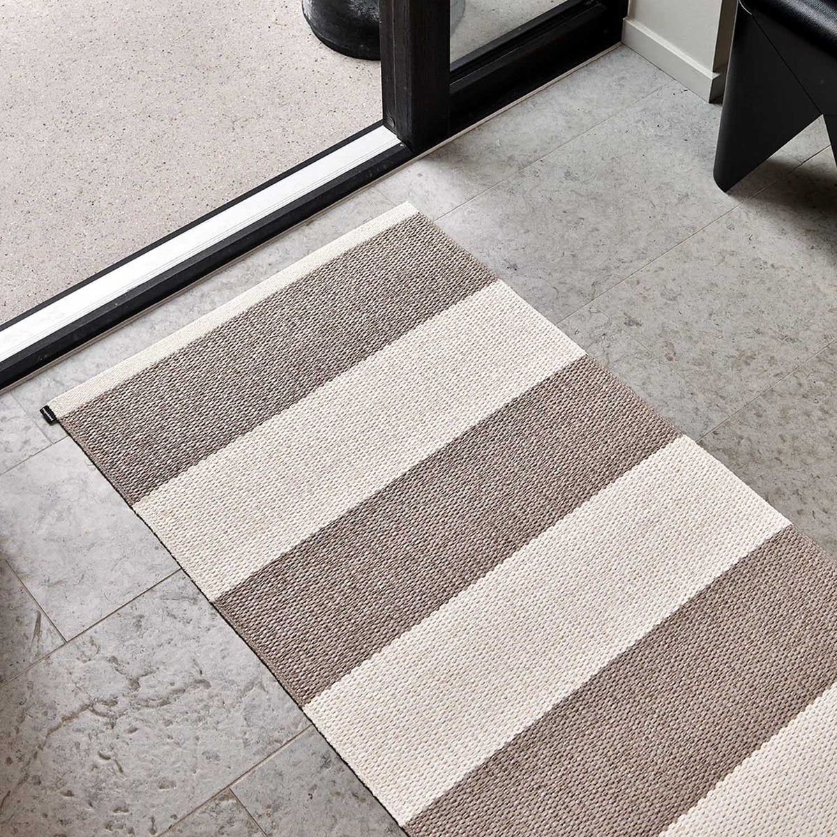 BOB Mud Runner Rug by Pappelina, showing bob mud runner rug in live shot.