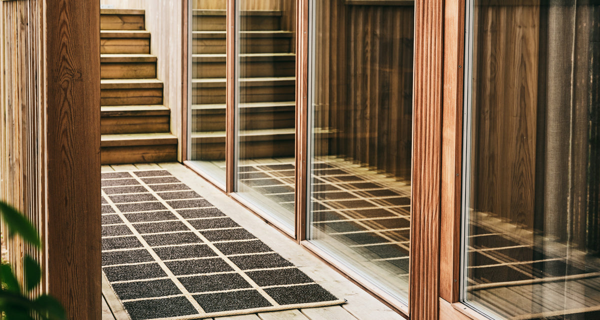 CRISS Dark Brown Runner Rug by Pappelina, showing criss dark brown runner rug in live shot.