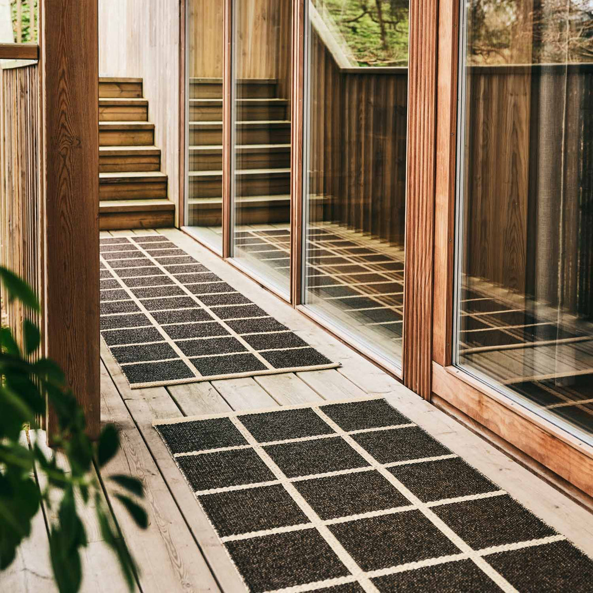 CRISS Dark Brown Runner Rug by Pappelina, showing criss dark brown runner rug in live shot.