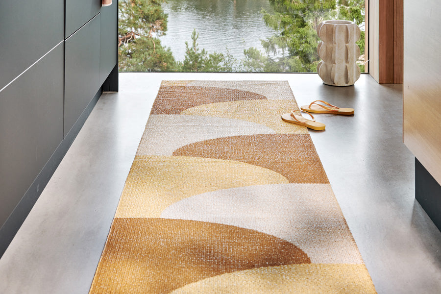 Hill Ochre Runner Rug by Pappelina, showing hill ochre runner rug in live shot.