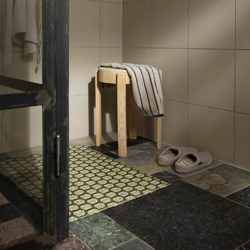 MIMI Dark Olive Runner Rug by Pappelina, showing mimi dark olive runner rug in live shot.