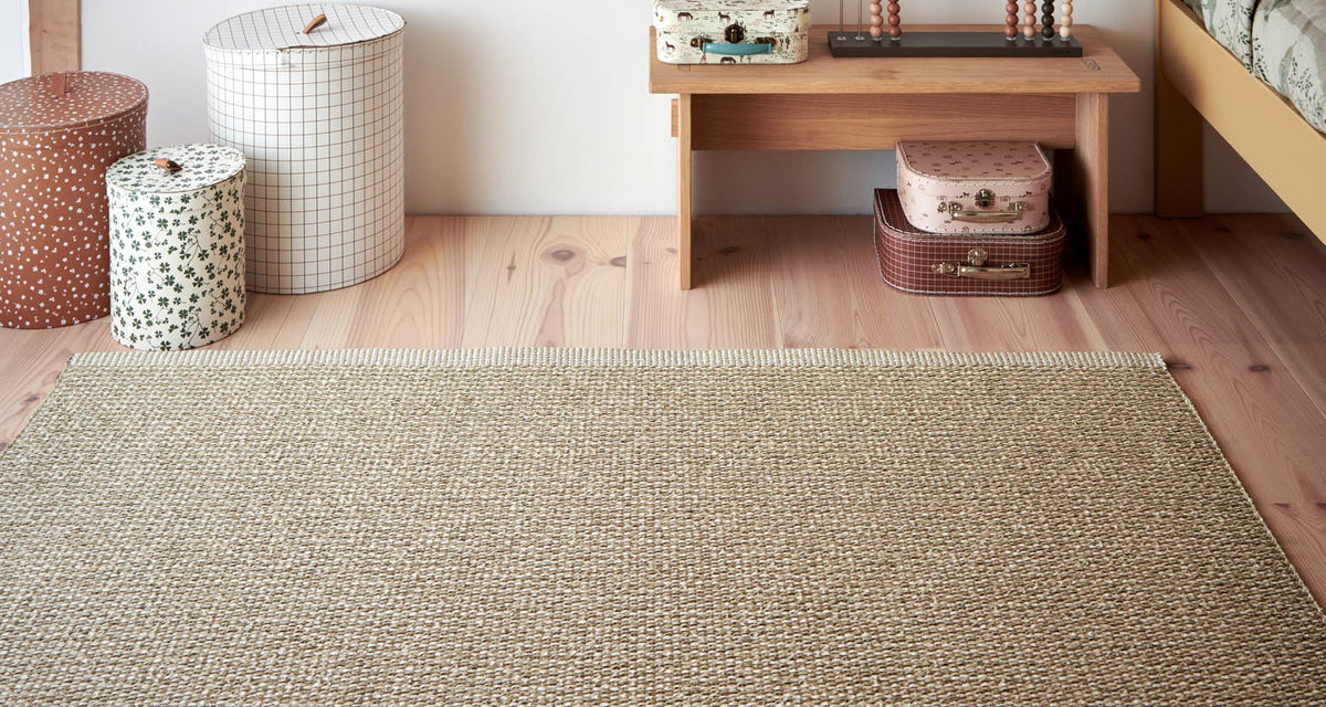 MONO Fossil Grey Rug by Pappelina, showing mono fossil grey rug in live shot.