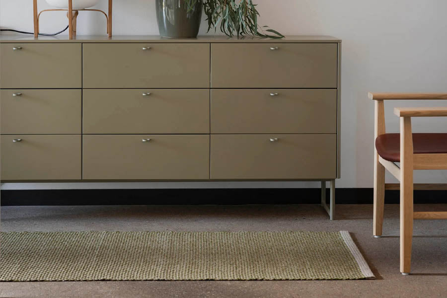 NILS Dark Olive Runner Rug by Pappelina, showing nils dark olive runner rug in live shot.