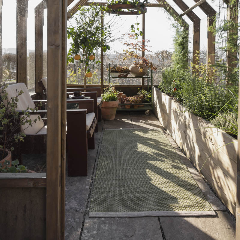 NILS Dark Olive Runner Rug by Pappelina, showing nils dark olive runner rug in live shot.