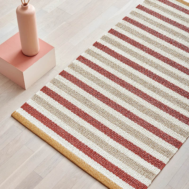 TEO Brick Runner Rug by Pappelina, showing teo brick runner rug in live shot.