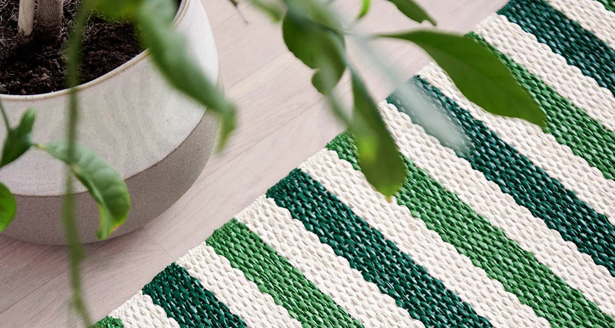 TEO Dark Green Runner Rug by Pappelina, showing teo dark green runner rug in live shot.