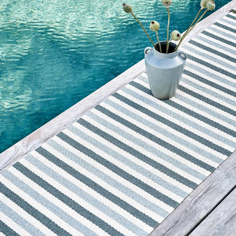 TEO Sage Runner Rug by Pappelina, showing teo sage runner rug in live shot.