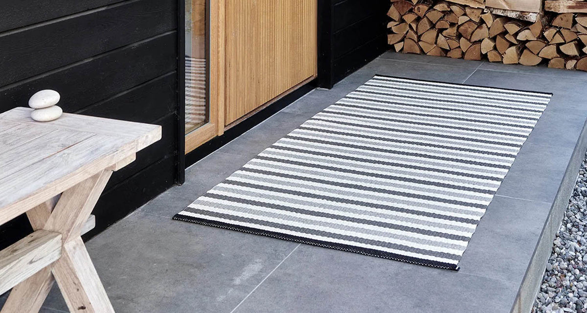 TEO Warm Grey Runner Rug by Pappelina, showing teo warm grey runner rug in live shot.
