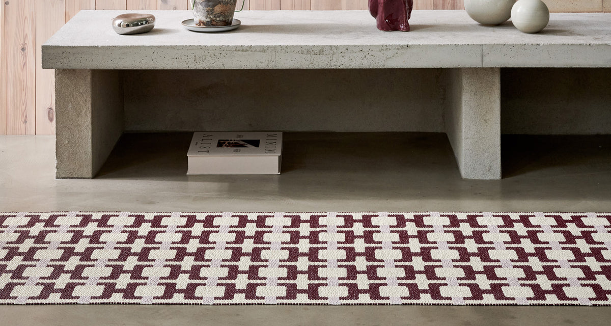 Tom Burgundy Runner Rug by Pappelina, showing tom burgundy runner rug in live shot.